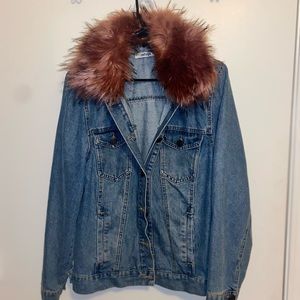 Jean jacket with pink fur. Barely worn.